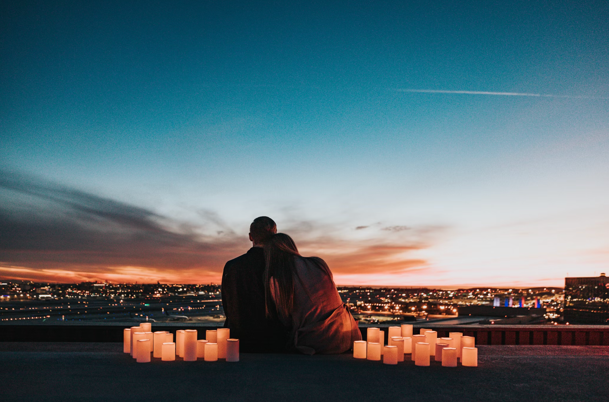Nathan Dumalo Couple on rooftop over looking city