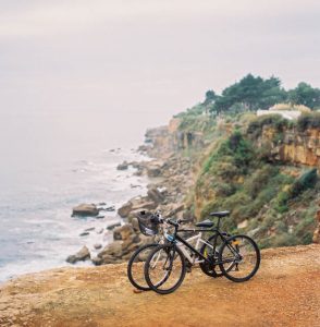 two bikes along the ocean