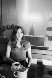 woman sitting in coffee shop