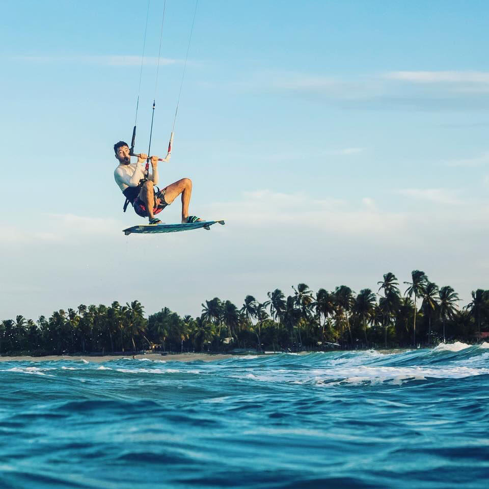 man kite surfing